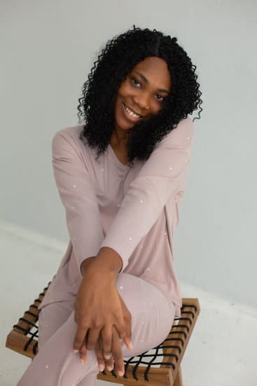 Happy Woman in Pyjama in Studio