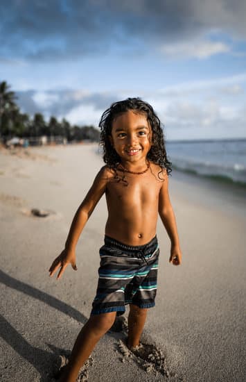 Smiling Little Boy at the Beach - Photos by Canva