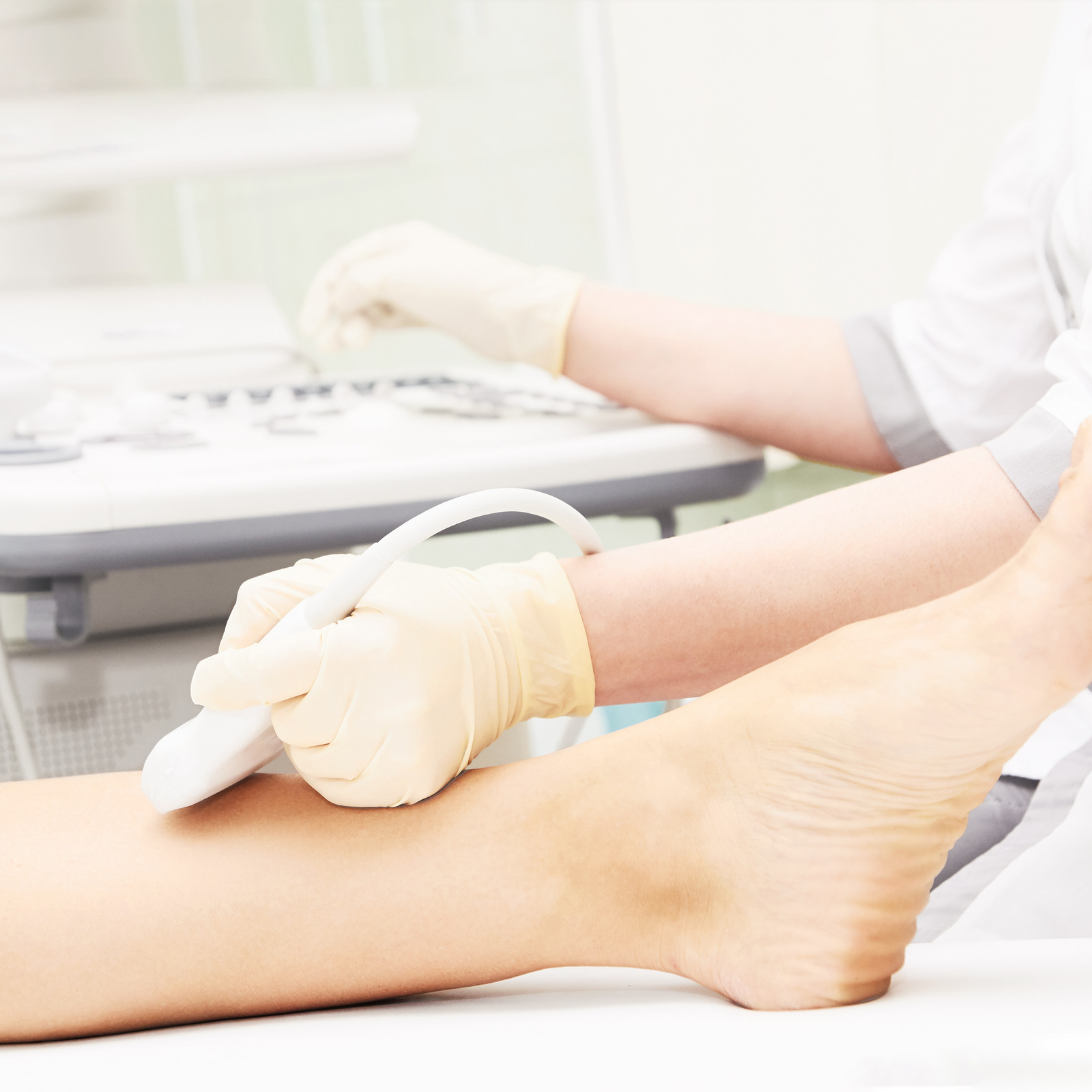 Doctor Ultrasound Knee Test. Scan Medical Equipment. Diagnosis Ultrasound Foot