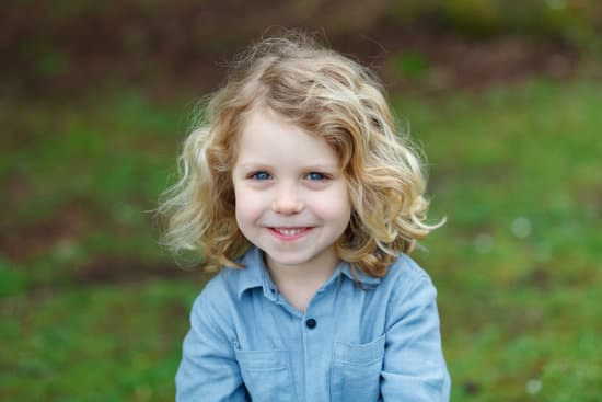 Happy Child With Long Blond Hair Photos By Canva