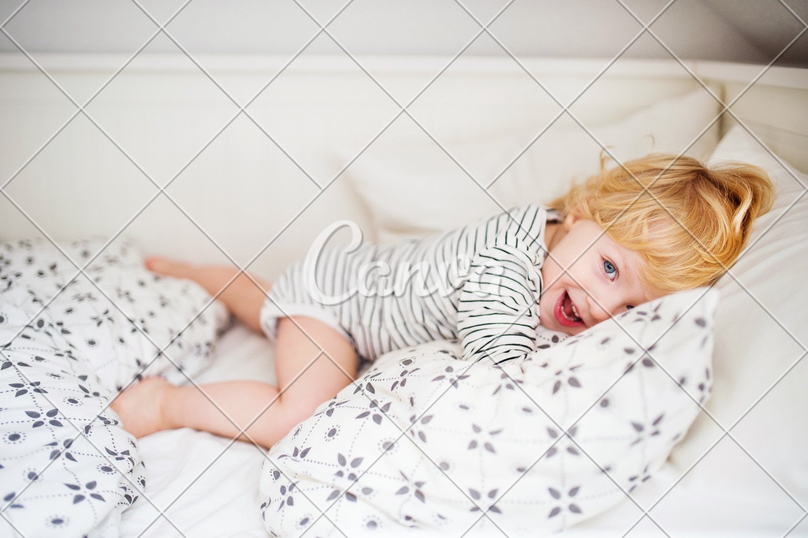 Cute Toddler Boy Lying On Bed At Home Photos By Canva
