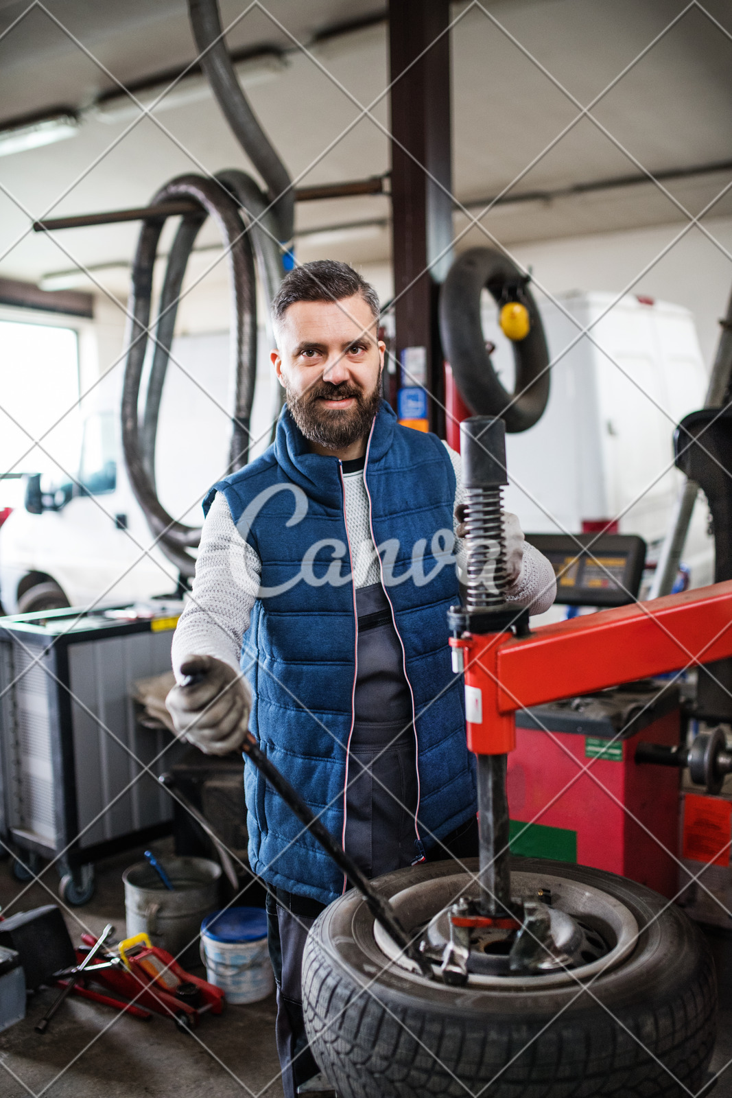 Man Mechanic Repairing A Car In A Garage Photos By Canva