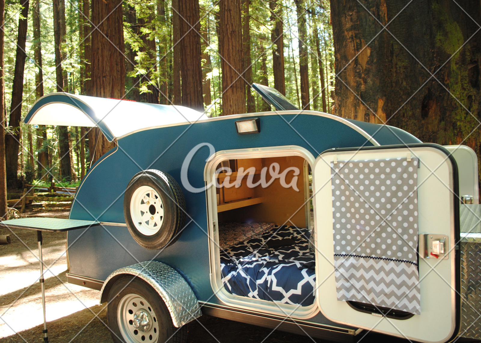 Teardrop Trailer With Open Doors And View To Bedroom