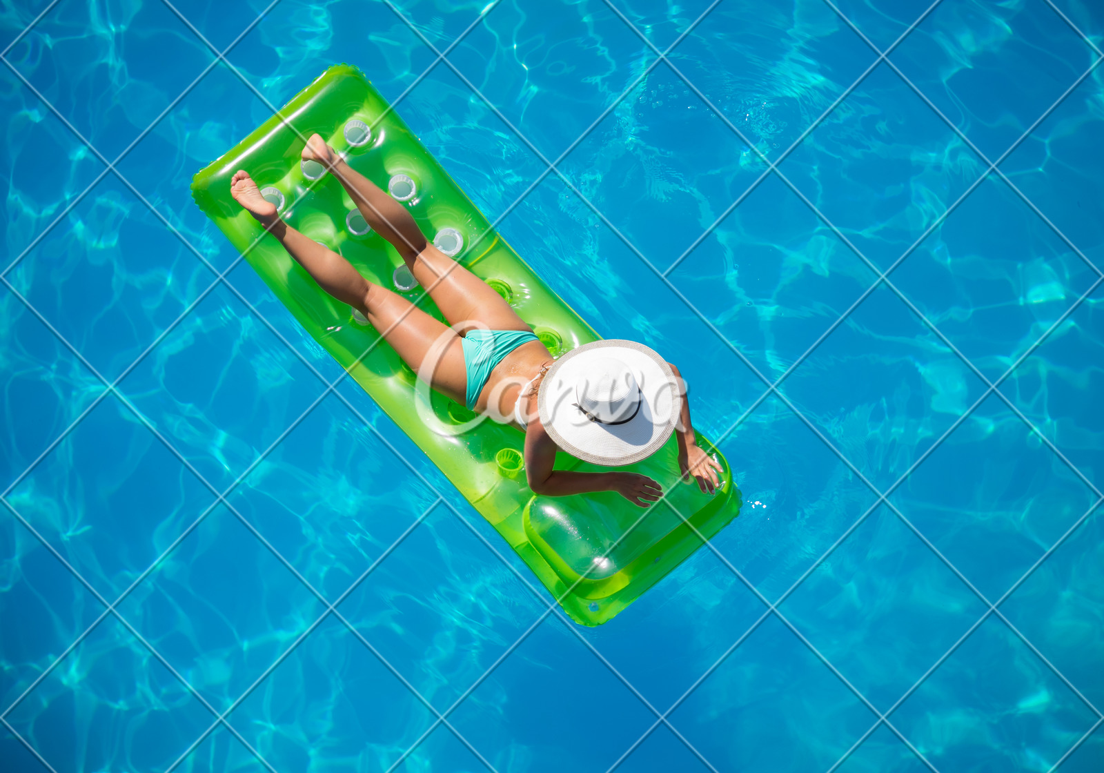 A Girl Is Relaxing In A Swimming Pool Photos By Canva