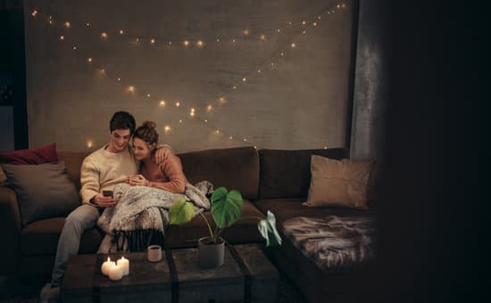Couple Relaxing In Cozy Living Room Photos By Canva