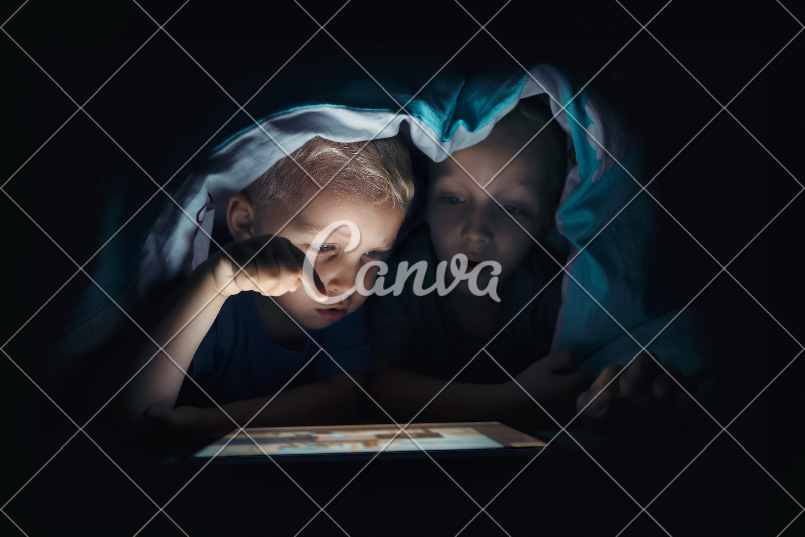 Two Kids With Tablet Computer In A Dark Room Photos By Canva