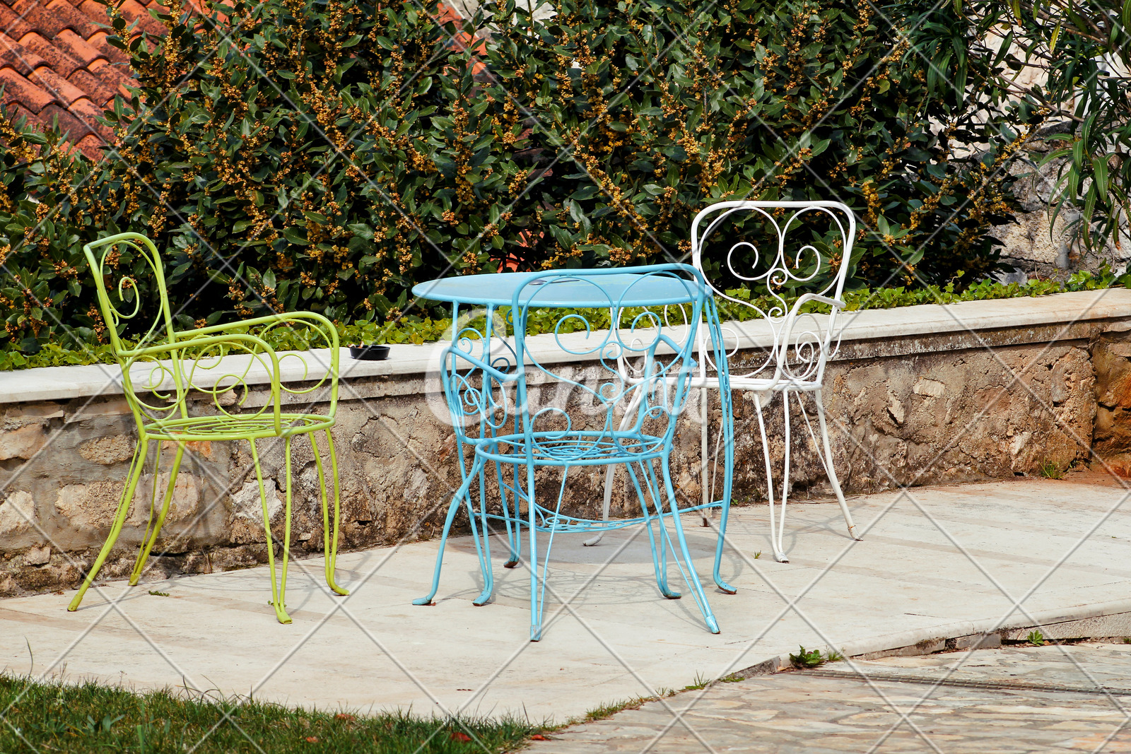 Chairs And A Table In Garden Colorful Steel Chairs And A Table