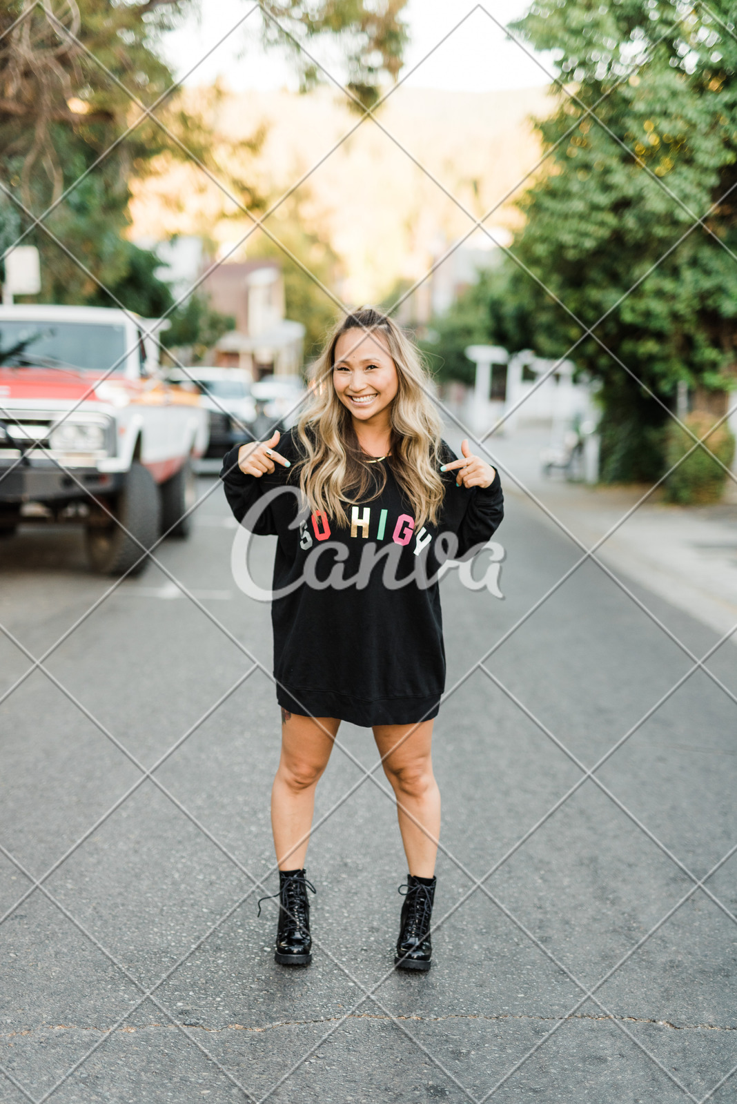 Blonde Asian Girl With Funny Sweater Photos By Canva