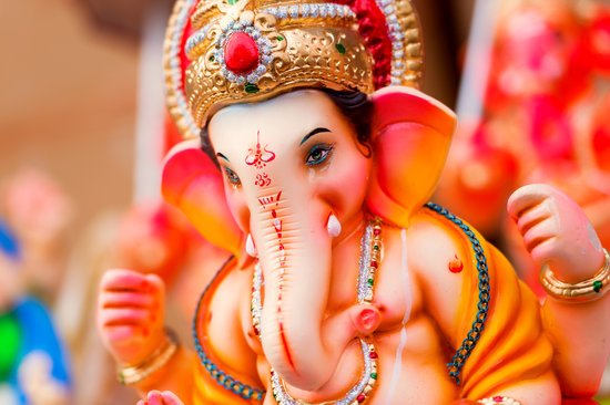 Indian Hindu God Lord Ganesha Statues - Photos by Canva