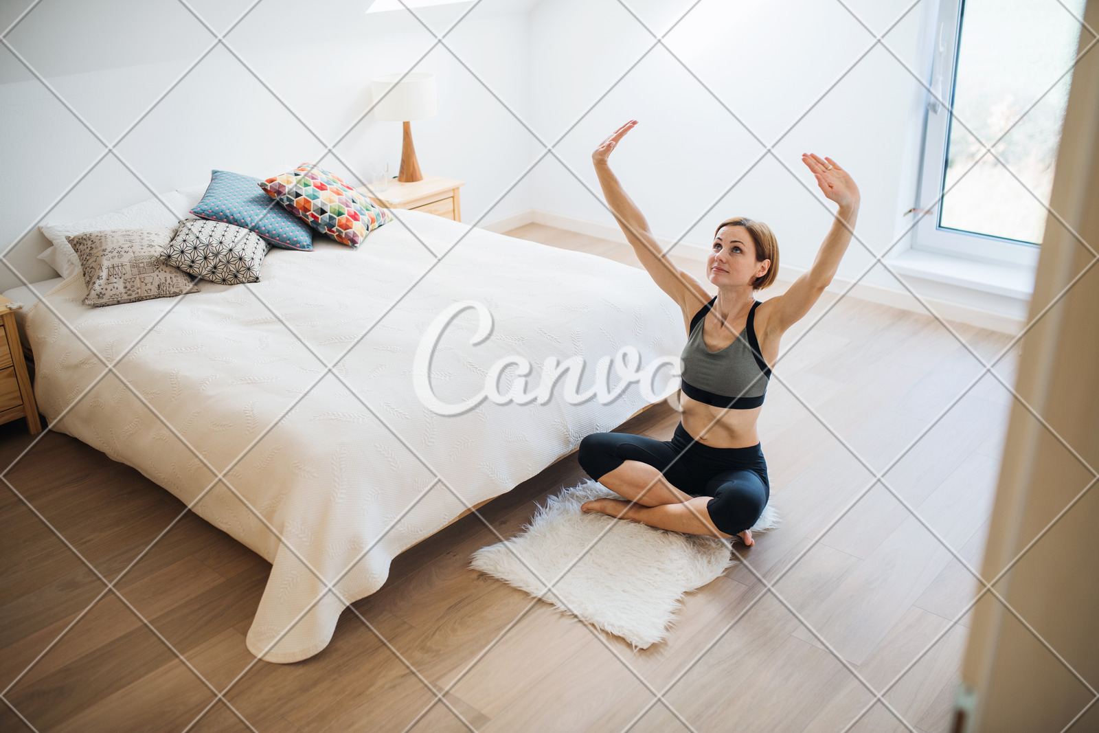 A Young Woman Doing Exercise Indoors In A Bedroom Copy