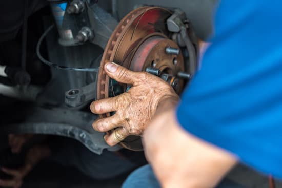 Disc Brake And Asbestos Brake Pads At Car Garage Photos By Canva