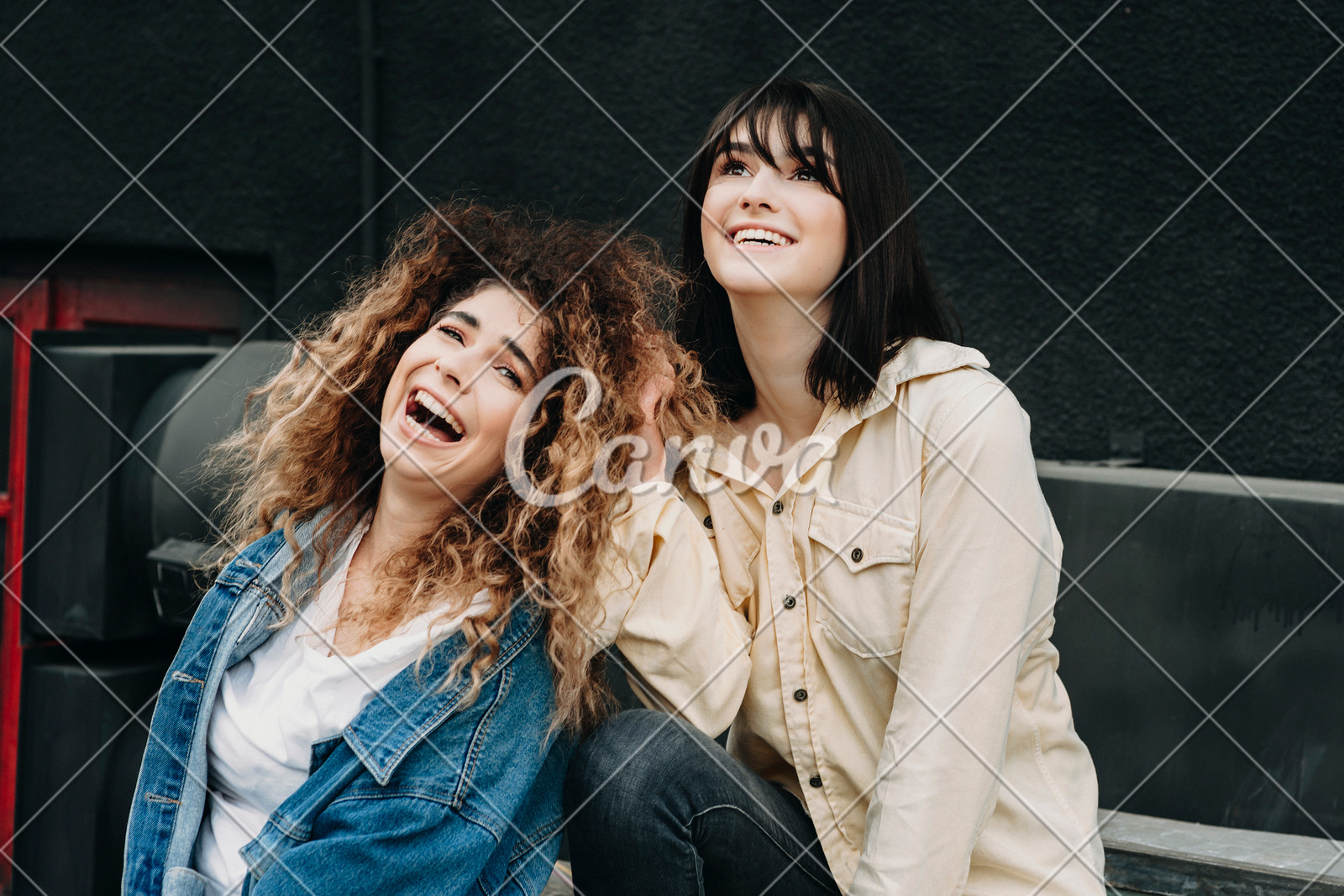 Portrait Of Two Beautiful Funny Girls Having Fun And