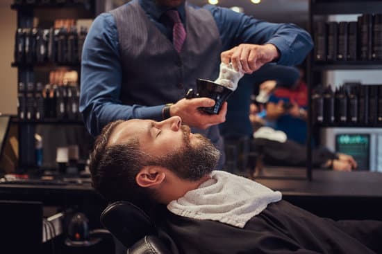 A Master Hairdresser Prepares The Face For Shaving Deals Foam