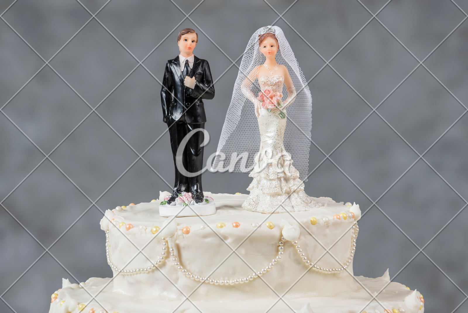 Figurines Of The Bride And Groom On A Wedding Cake Photos By Canva