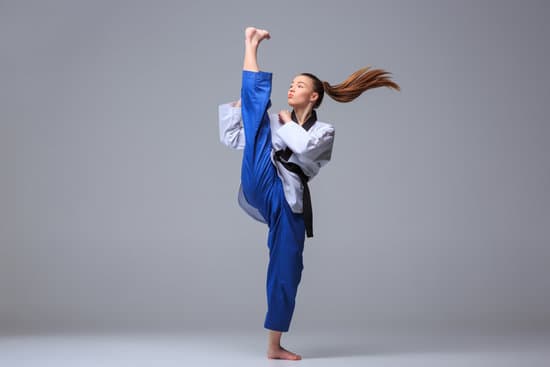 Karate girl is practice with trainer