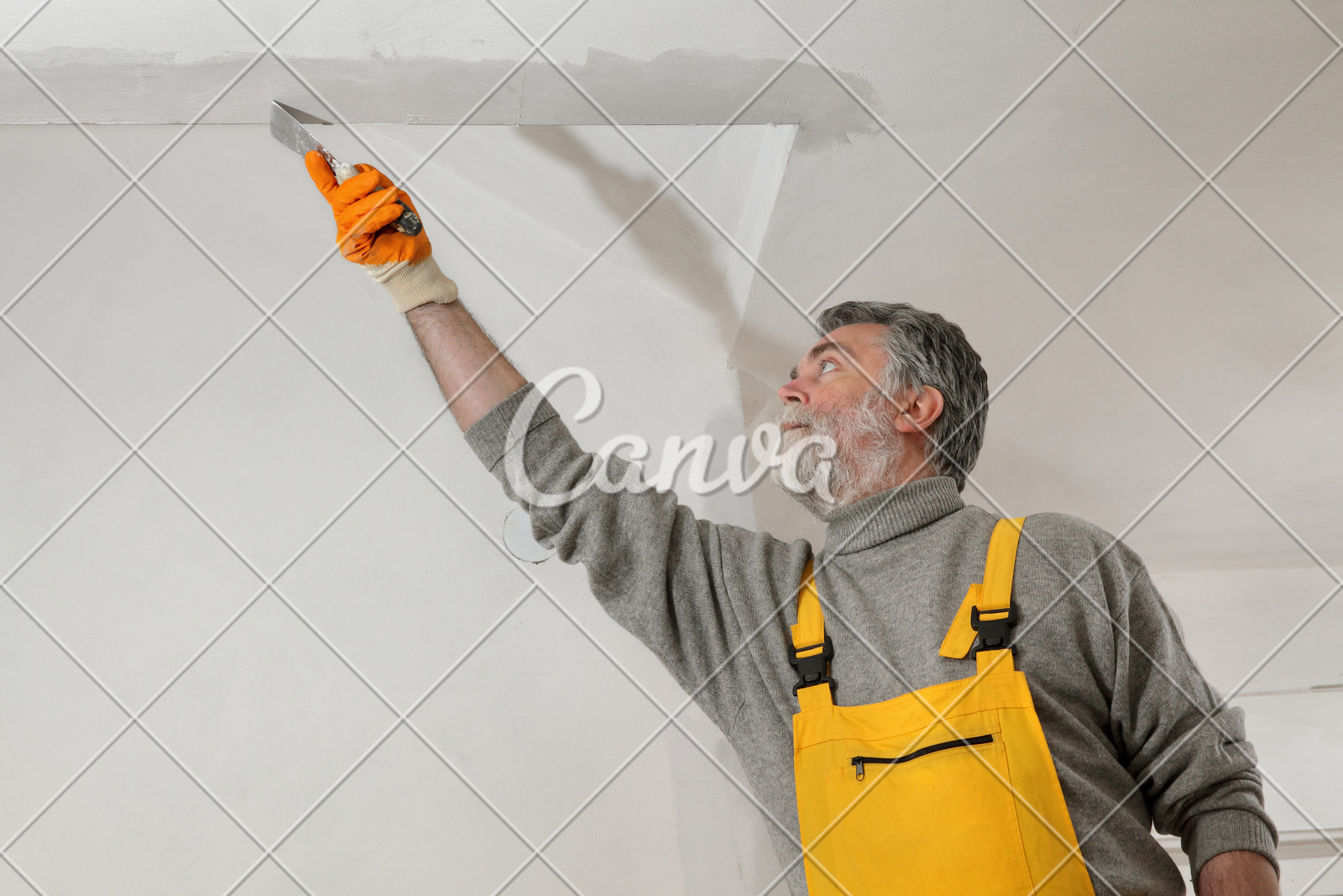 Worker Repairing Plaster At Ceiling Photos By Canva