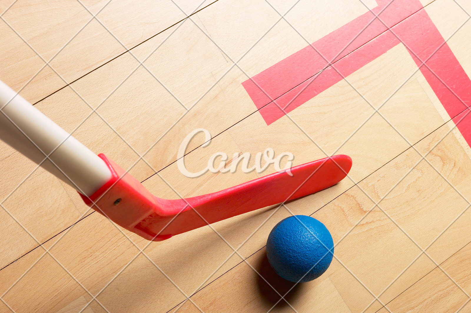 Field Hockey Stick And Ball In Gym Photos By Canva