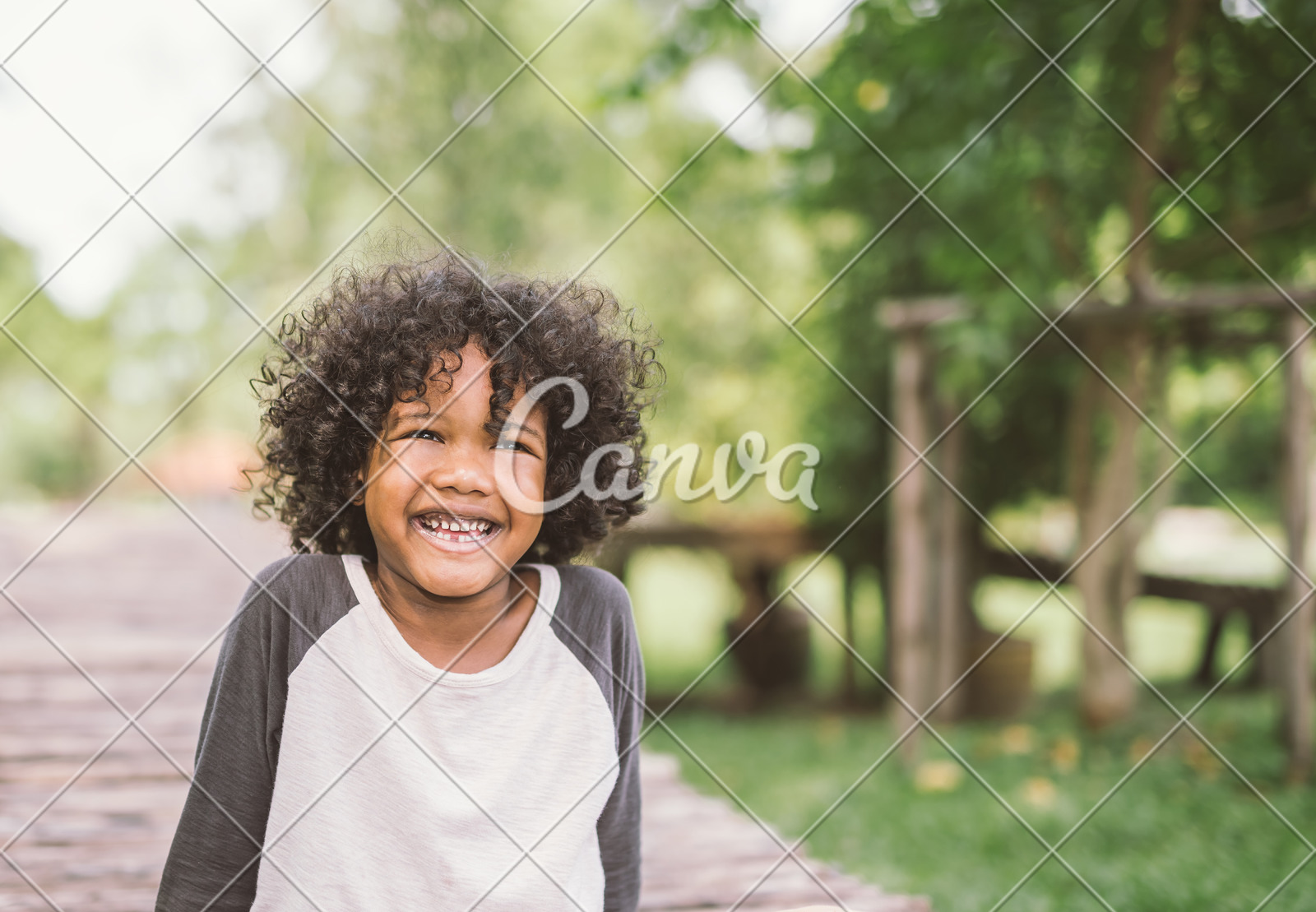Portrait Of A Cute African American Little Boy Smiling Photos