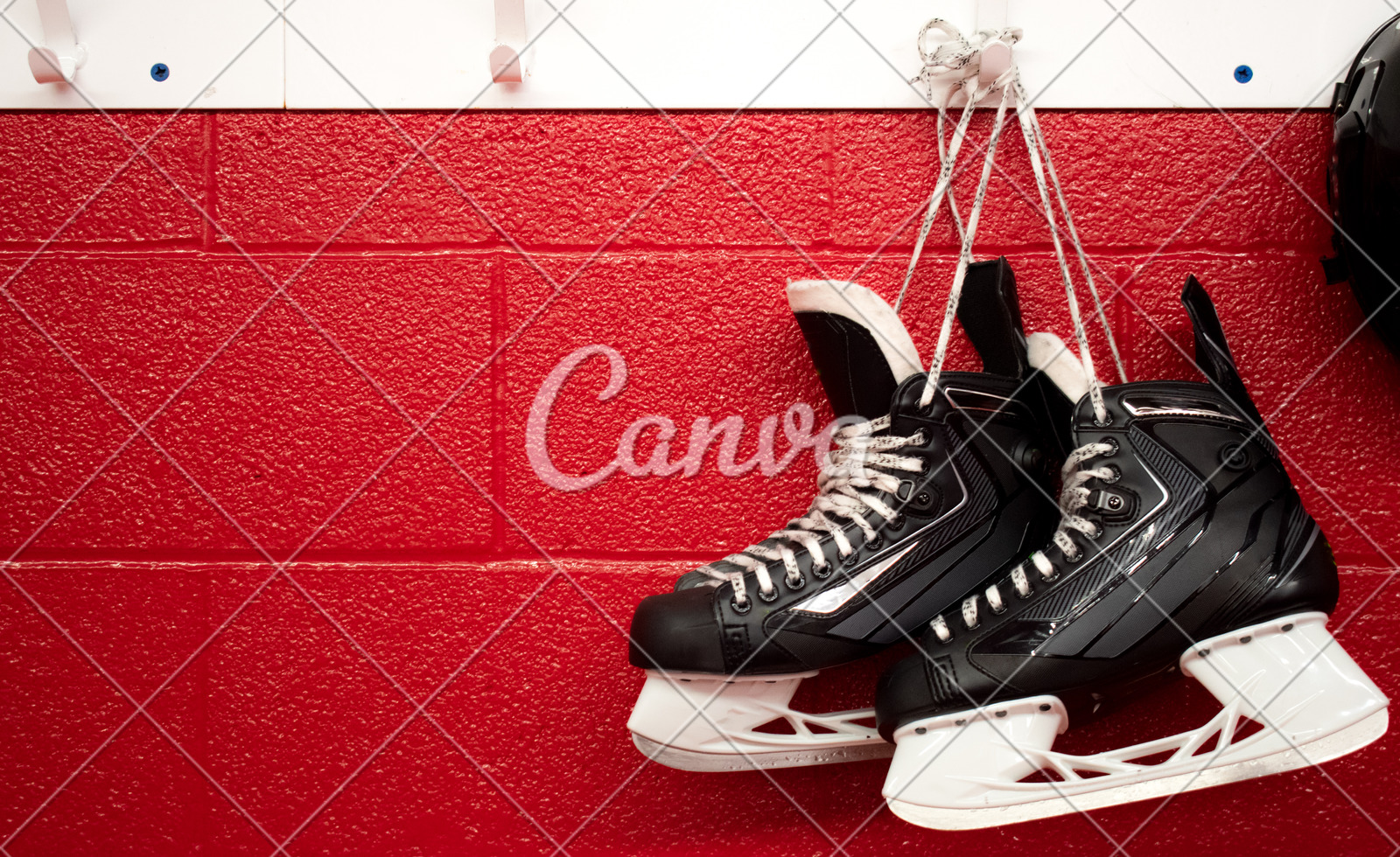 Hockey Skates And Helmet Hanging In Locker Room With Copy