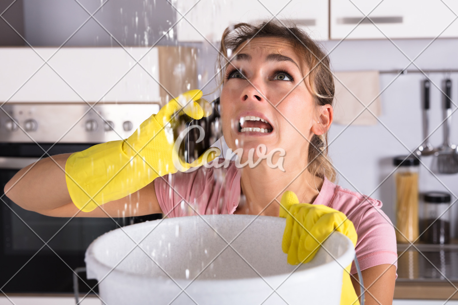 Woman Calling Plumber To Fix Water Leaking From Ceiling Photos