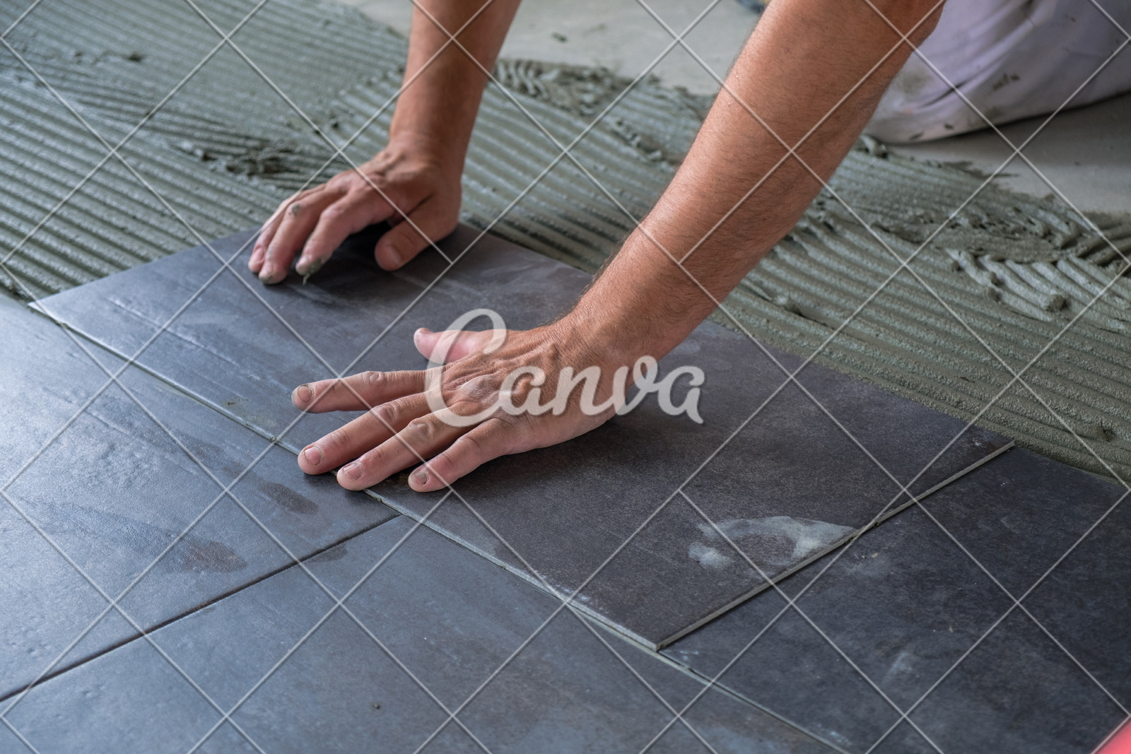 Worker Installing Ceramic Floor Tiles Photos By Canva