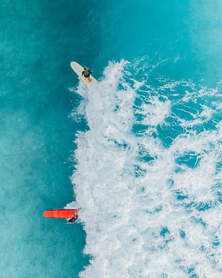 Person Surfing on Sea Waves - Photos by Canva