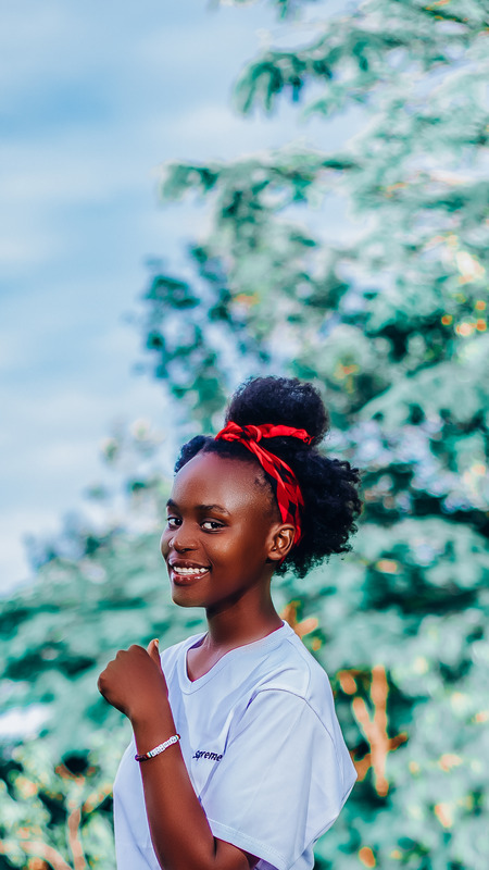 Happy African American Woman With Hair Tied Up Photos By Canva