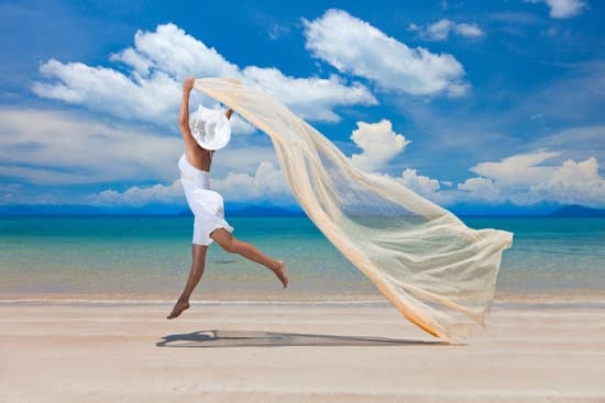 Happy woman on the beach