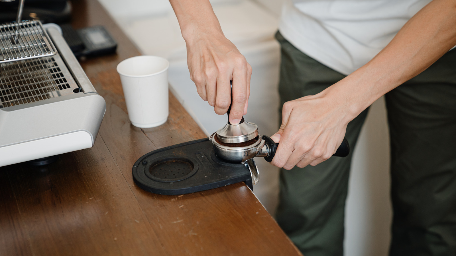 Crop Barista Grounding Coffee Into Portafilter Photos By Canva